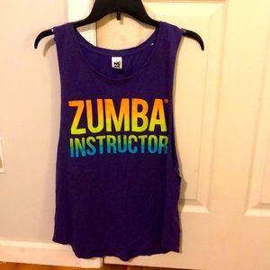Rare Zumba tank, size medium, purple. Pairs with many leggings color options.